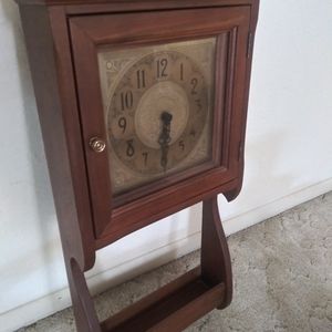 Wall hanging clock with bottom shelf